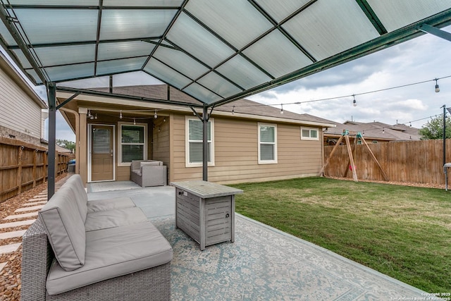 view of patio / terrace with a fenced backyard and an outdoor living space