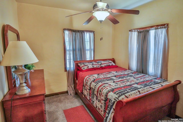 745 County Road 2645, Moore, TX 78057 - carpeted bedroom featuring baseboards and ceiling fan