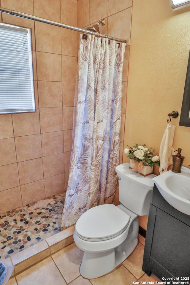 745 County Road 2645, Moore, TX 78057 - full bathroom featuring toilet, tile patterned flooring, and a stall shower