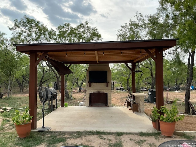 745 County Road 2645, Moore, TX 78057 - surrounding community with a carport and a patio area