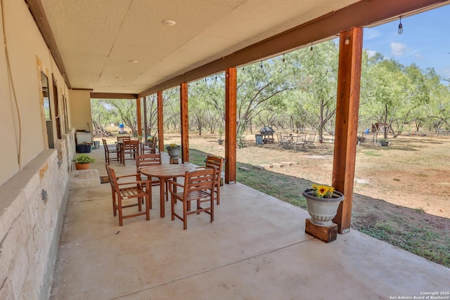 745 County Road 2645, Moore, TX 78057 - view of patio / terrace featuring outdoor dining area