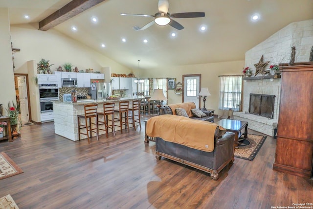 745 County Road 2645, Moore, TX 78057 - living area featuring beam ceiling, a ceiling fan, recessed lighting, and dark wood finished floors