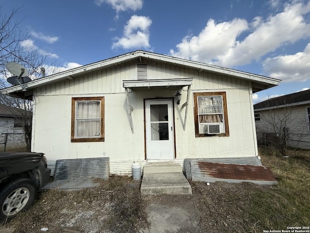 view of front of home with fence