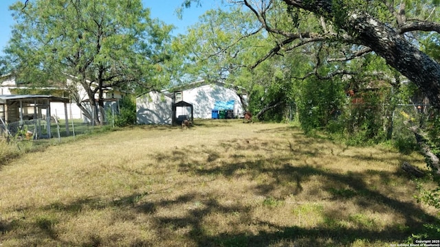 view of yard featuring fence