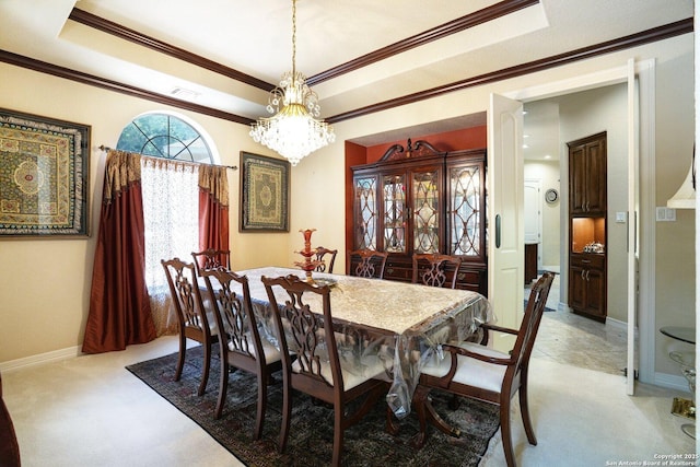 20646 Wahl, Garden Ridge, TX 78266 - dining space with light carpet, a raised ceiling, ornamental molding, a chandelier, and baseboards