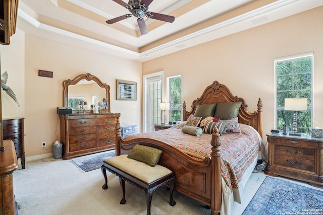 20646 Wahl, Garden Ridge, TX 78266 - carpeted bedroom with a tray ceiling, multiple windows, ornamental molding, and ceiling fan