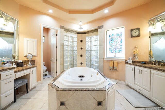 20646 Wahl, Garden Ridge, TX 78266 - full bathroom featuring a whirlpool tub, tile patterned floors, tiled shower, toilet, and vanity
