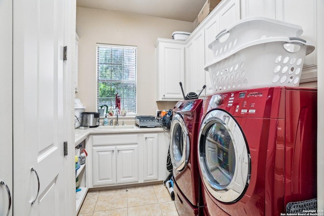 20646 Wahl, Garden Ridge, TX 78266 - laundry area featuring independent washer and dryer, cabinet space, and light tile patterned floors
