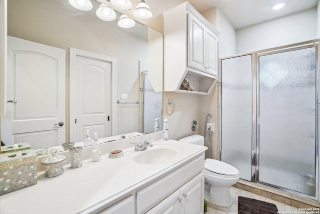 20646 Wahl, Garden Ridge, TX 78266 - bathroom with a stall shower, toilet, vanity, and tile patterned flooring