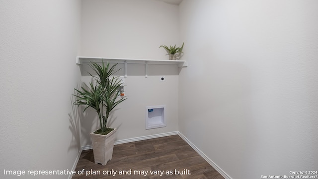 laundry area featuring dark wood finished floors, laundry area, hookup for an electric dryer, hookup for a washing machine, and baseboards
