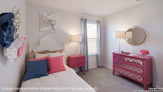 bedroom with visible vents, baseboards, carpet flooring, and multiple windows