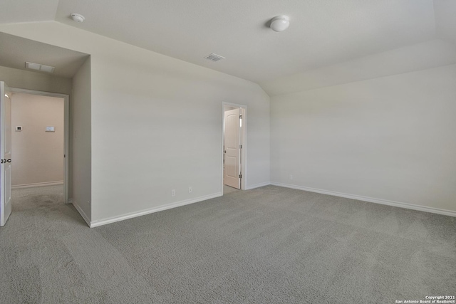 12127 Jasper Strm, San Antonio, TX 78245 - empty room with lofted ceiling, carpet, a smoke detector, and baseboards