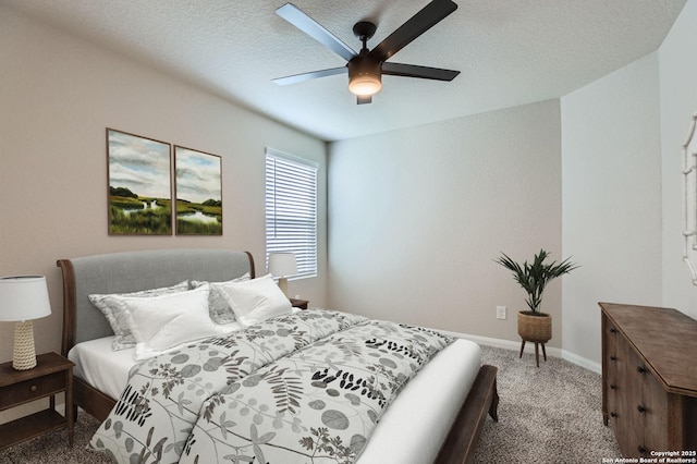 5680 Jasmine Spur, Bulverde, TX 78163 - bedroom with carpet flooring, baseboards, ceiling fan, and a textured ceiling