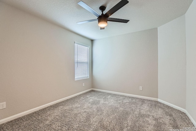5680 Jasmine Spur, Bulverde, TX 78163 - spare room with ceiling fan, carpet, baseboards, and a textured ceiling