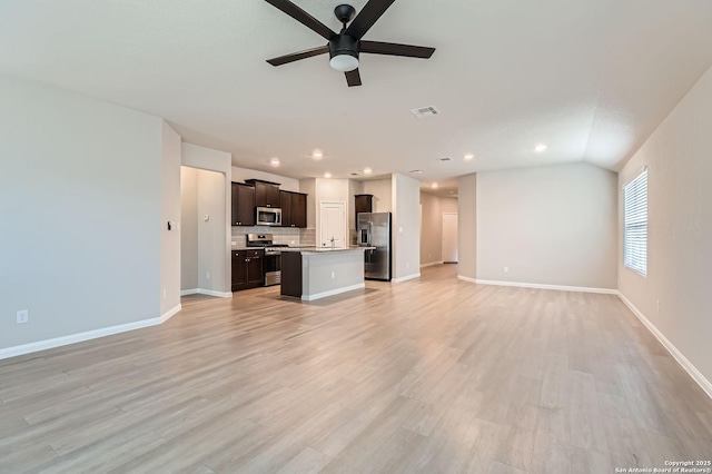 5680 Jasmine Spur, Bulverde, TX 78163 - unfurnished living room with ceiling fan, light wood-style flooring, baseboards, and recessed lighting