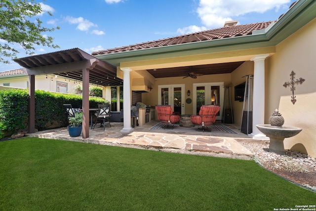 exterior space featuring ceiling fan and french doors