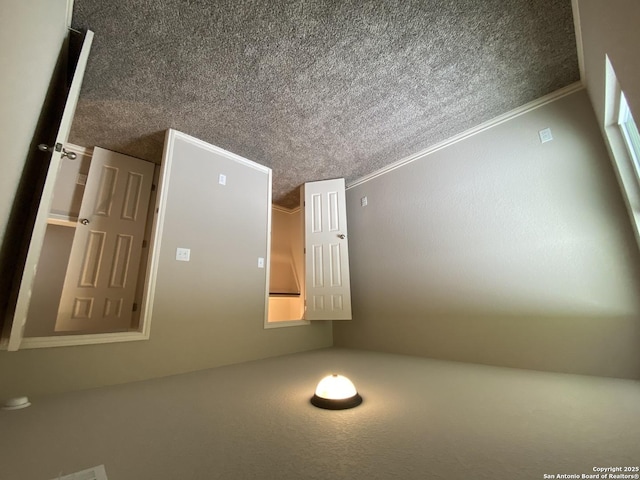 spare room featuring a textured ceiling