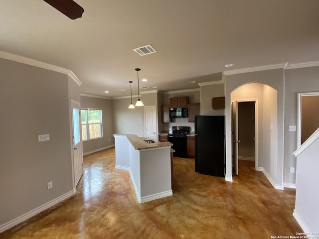 kitchen with black appliances, an island with sink, arched walkways, baseboards, and visible vents