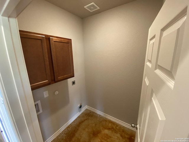 laundry area with visible vents, hookup for an electric dryer, baseboards, cabinet space, and washer hookup