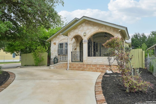 1923 W Pyron Ave, San Antonio, TX 78211 - exterior space featuring fence private yard and stone siding