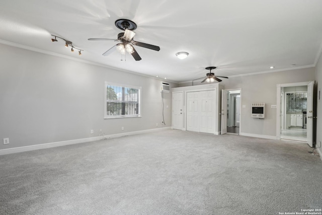 1923 W Pyron Ave, San Antonio, TX 78211 - unfurnished living room with ceiling fan, baseboards, heating unit, an AC wall unit, and ornamental molding