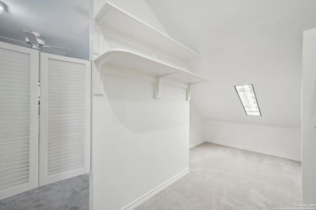 1923 W Pyron Ave, San Antonio, TX 78211 - spacious closet featuring lofted ceiling, carpet, and a ceiling fan