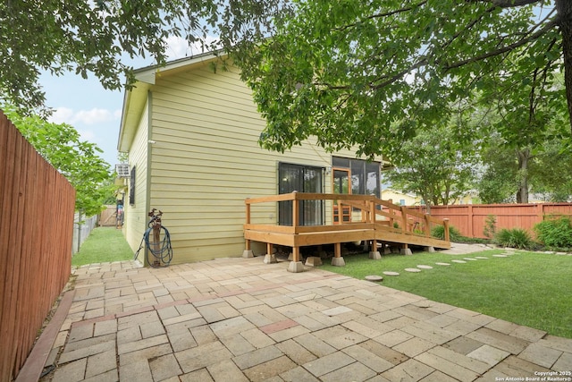 1923 W Pyron Ave, San Antonio, TX 78211 - rear view of house with a patio, a wooden deck, a fenced backyard, and a yard