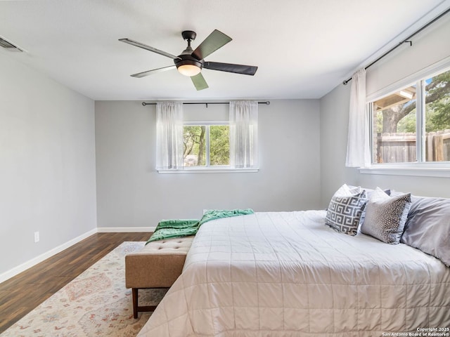 106 Castleoaks Dr, San Antonio, TX 78213 - bedroom with wood finished floors, ceiling fan, visible vents, and baseboards