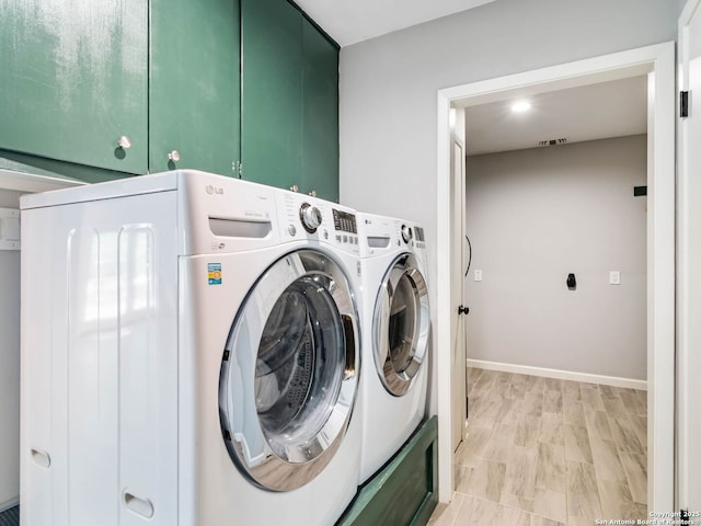 106 Castleoaks Dr, San Antonio, TX 78213 - clothes washing area featuring cabinet space, washing machine and clothes dryer, and baseboards