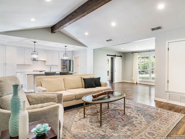 106 Castleoaks Dr, San Antonio, TX 78213 - living area with visible vents, a barn door, recessed lighting, dark wood finished floors, and vaulted ceiling with beams