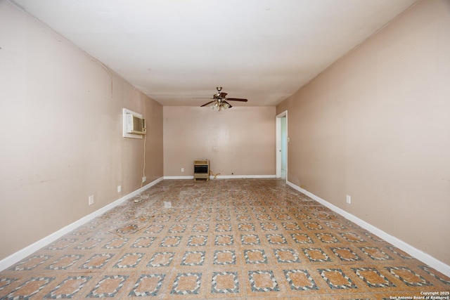 unfurnished room featuring a wall mounted air conditioner, ceiling fan, baseboards, and heating unit
