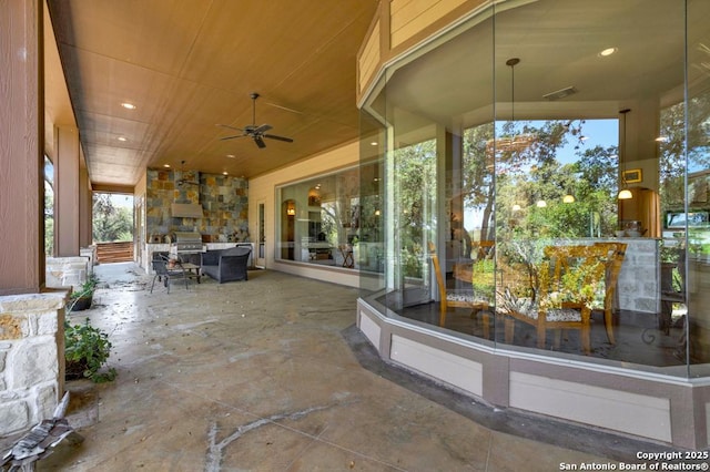 view of patio featuring ceiling fan and an outdoor hangout area