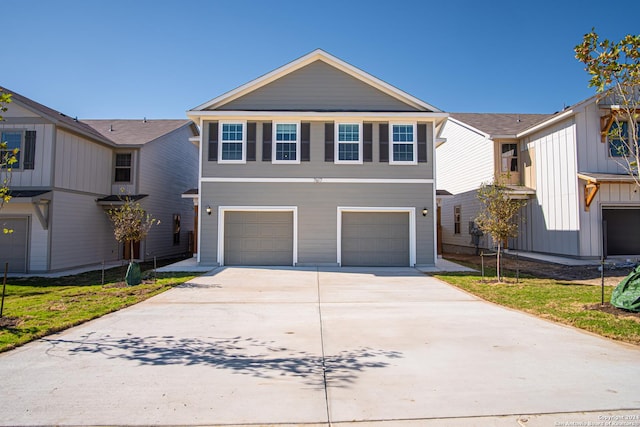 traditional home with an attached garage and driveway