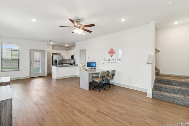office with light wood-type flooring, baseboards, recessed lighting, and ceiling fan