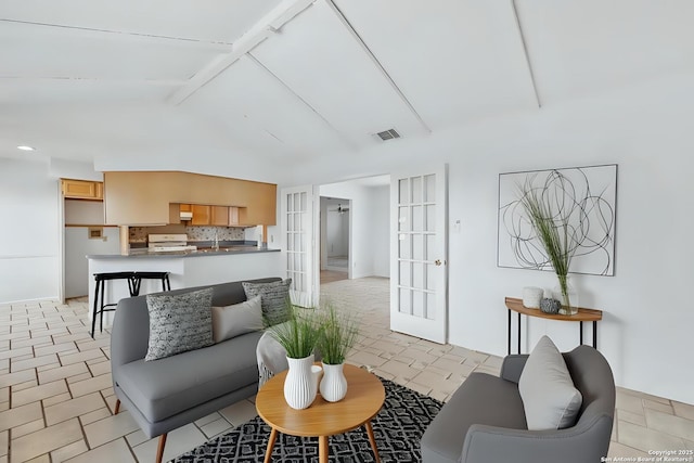 5822 Bennington, San Antonio, TX 78228 - living room featuring visible vents and lofted ceiling with beams