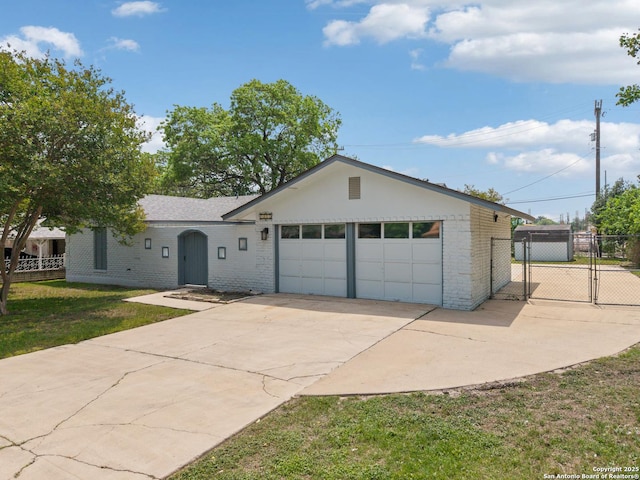 5822 Bennington, San Antonio, TX 78228 - ranch-style house featuring a front lawn, driveway, fence, brick siding, and an attached garage