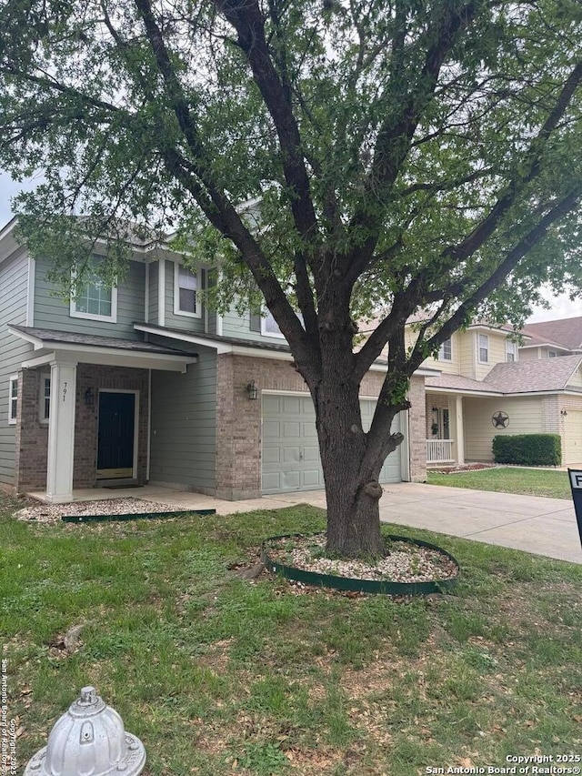791 Sycamore Moon, San Antonio, TX 78216 - view of front facade featuring brick siding, driveway, and a garage