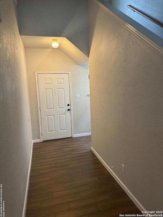 791 Sycamore Moon, San Antonio, TX 78216 - corridor featuring vaulted ceiling, baseboards, and dark wood finished floors