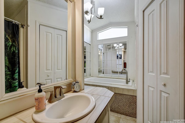 1340 Hinch, New Braunfels, TX 78132 - full bathroom featuring an inviting chandelier, a textured ceiling, and a closet