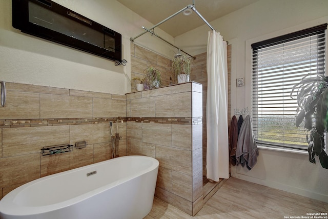 1340 Hinch, New Braunfels, TX 78132 - full bathroom featuring baseboards, a soaking tub, and curtained shower