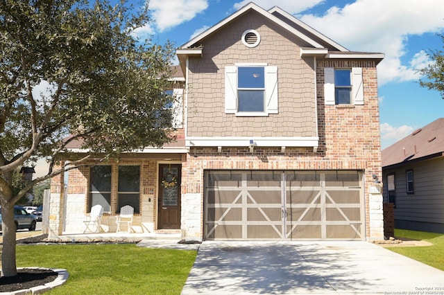 view of front facade with concrete driveway, an attached garage, covered porch, brick siding, and a front yard