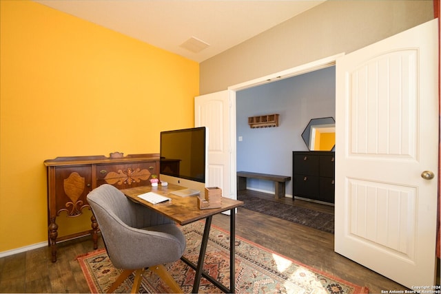 home office with baseboards and wood finished floors