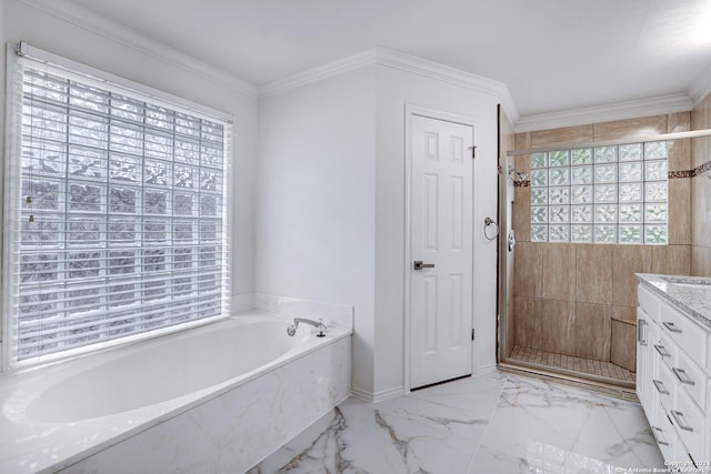 bathroom with baseboards, marble finish floor, a shower stall, a garden tub, and vanity