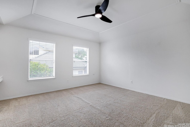 unfurnished room with baseboards, a ceiling fan, and carpet flooring