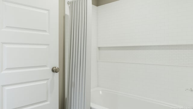 2055 Olivia Dr, New Braunfels, TX 78130 - full bath with shower / bathtub combination with curtain