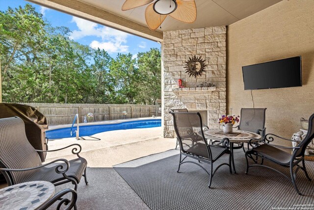534 Mission Hill Run, New Braunfels, TX 78132 - view of patio / terrace featuring a fenced in pool, a fenced backyard, and ceiling fan