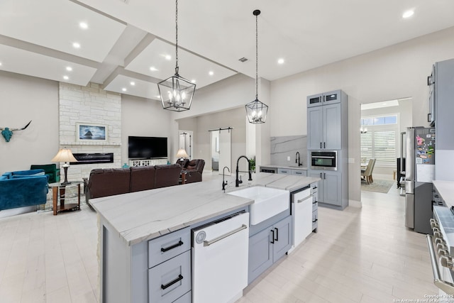 1191 Glenwood, Bulverde, TX 78163 - kitchen with recessed lighting, stainless steel appliances, a sink, open floor plan, and a center island with sink