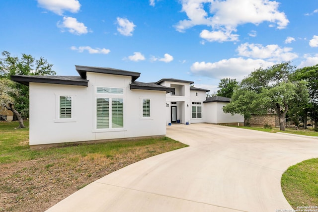 1191 Glenwood, Bulverde, TX 78163 - prairie-style house with stucco siding and curved driveway