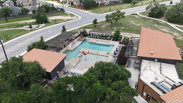 birds eye view of property with a residential view