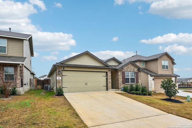 view of front facade featuring cooling unit, driveway, a front yard, and fence